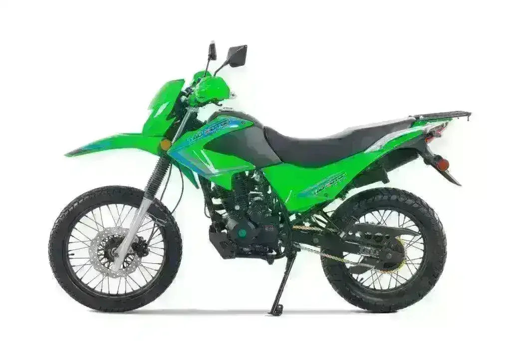 Green 250cc dual sport motorcycle with knobby tires and side stand on white background