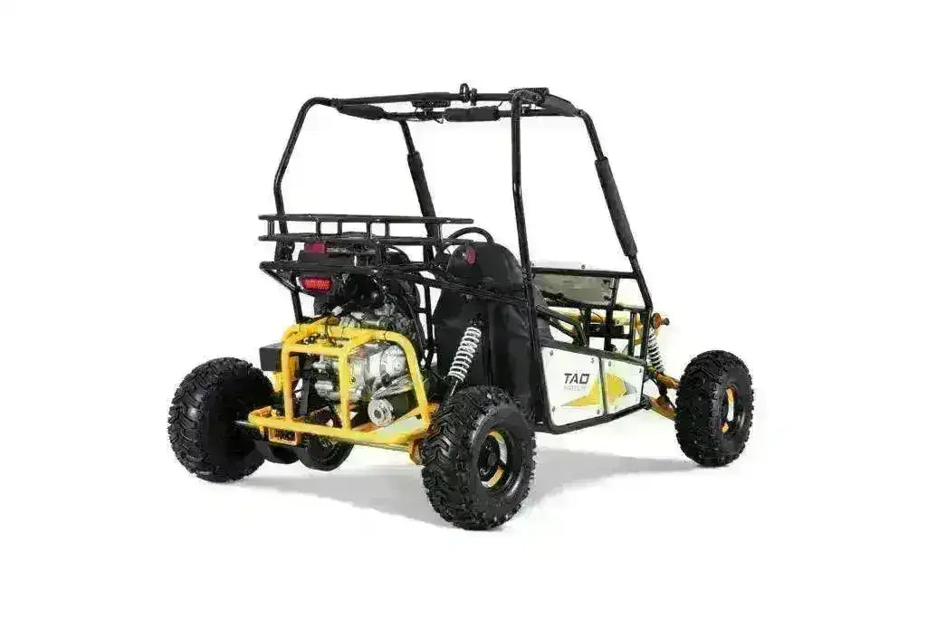 Yellow 125cc youth go-kart with roll cage, rugged tires, and rear engine on white background