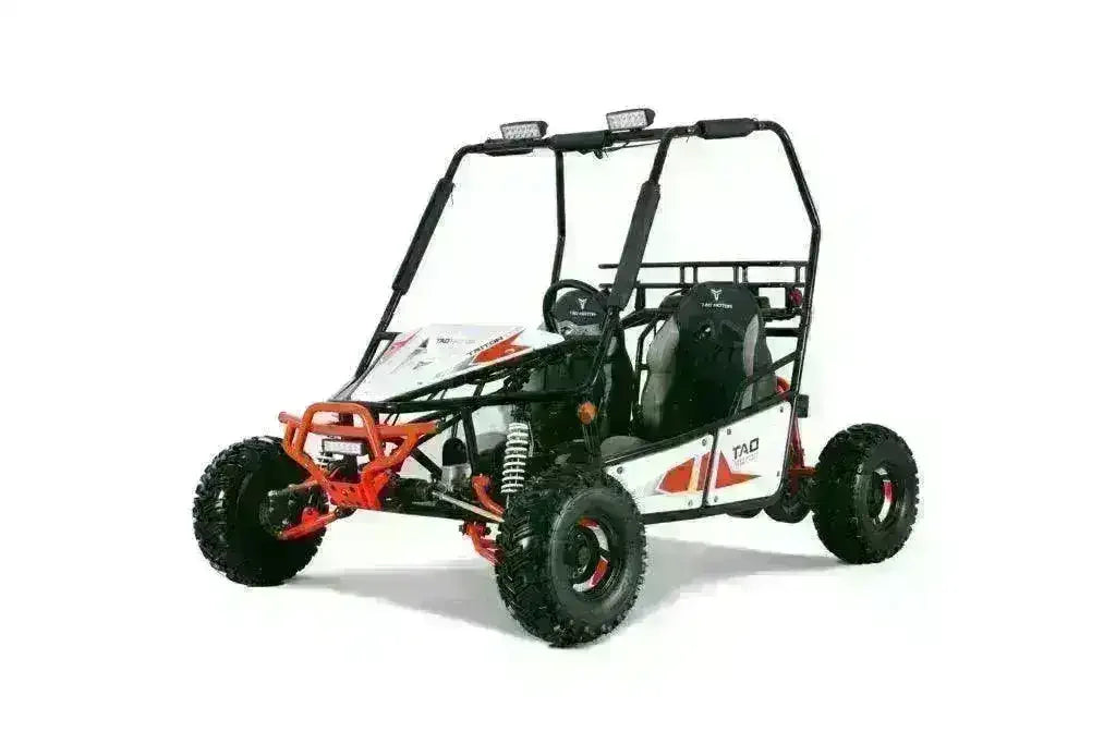 Red and white Triton two-seat go-kart with overhead lights and black frame, front three-quarter view