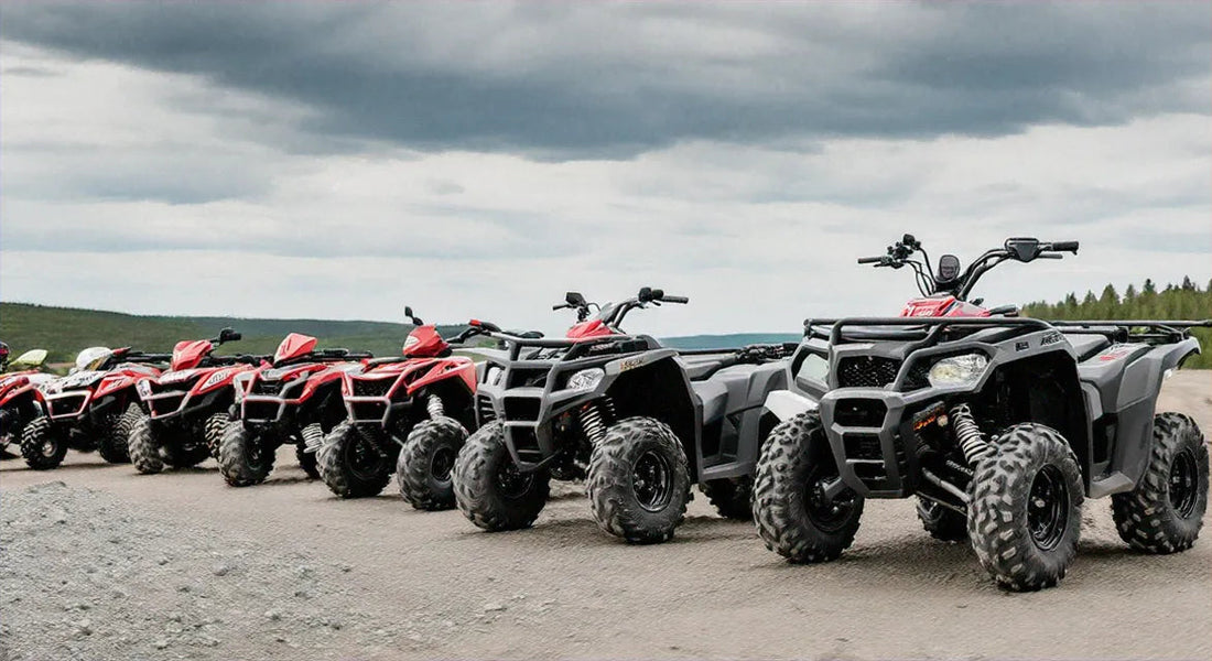 Lineup of all-terrain vehicles (ATVs) parked outdoors on gravel under cloudy sky