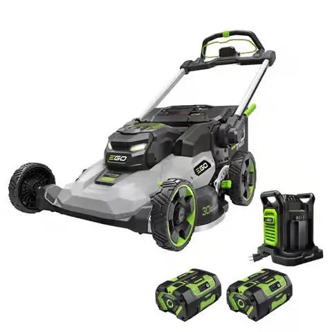 Cordless electric lawn mower with charger and two rechargeable batteries, on white background.