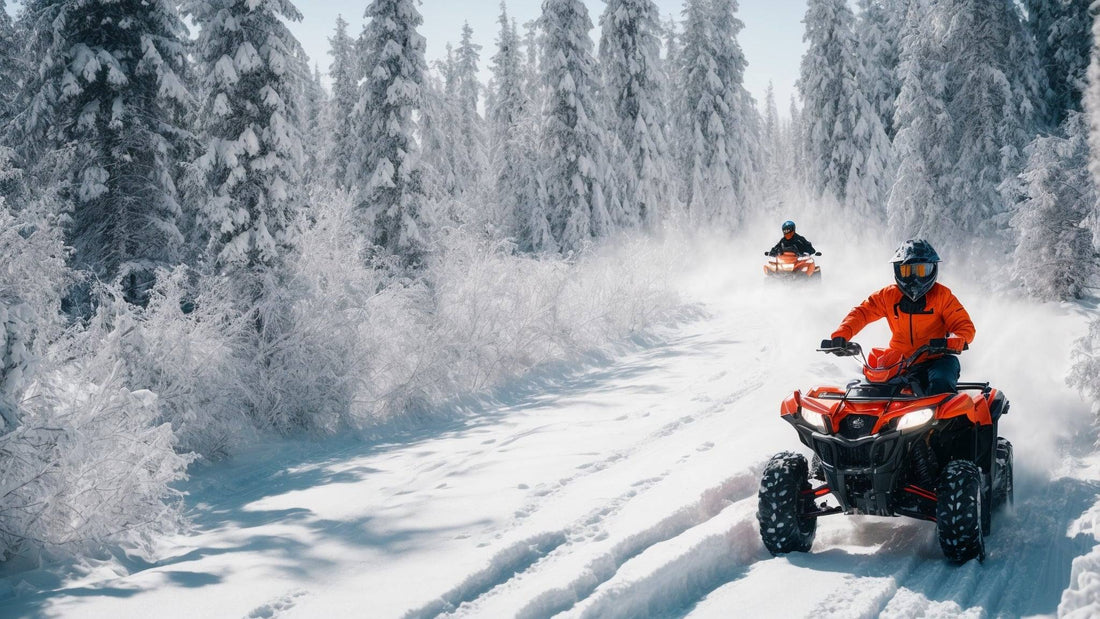 Two riders on orange ATVs driving through snowy forest trails in winter wilderness.
