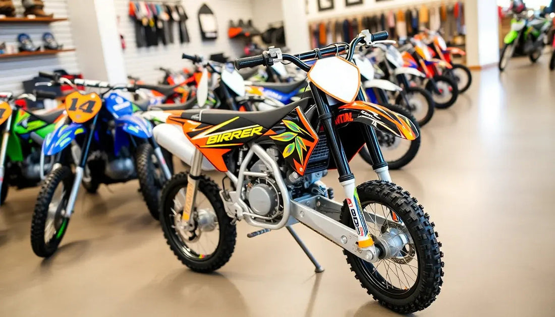 Off-road dirt bike with colorful graphics on showroom floor, surrounded by other motorcycles.