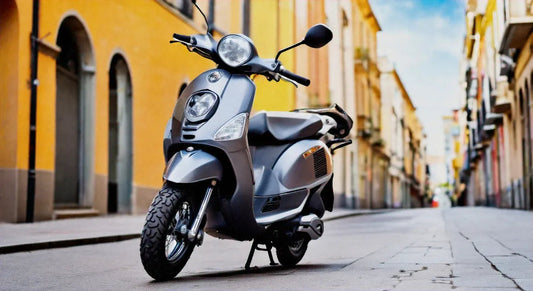 Modern gray scooter parked on a city street with colorful buildings in the background
