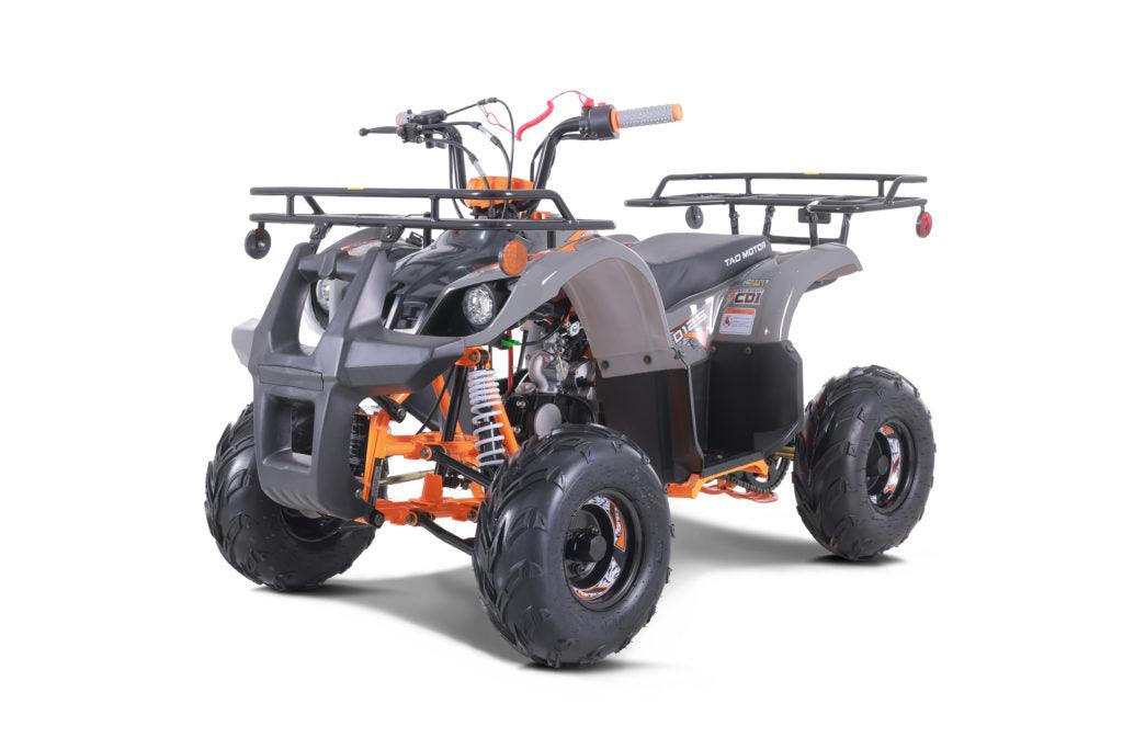 Dark gray and orange ATV with rugged tires and front cargo racks, side angle view