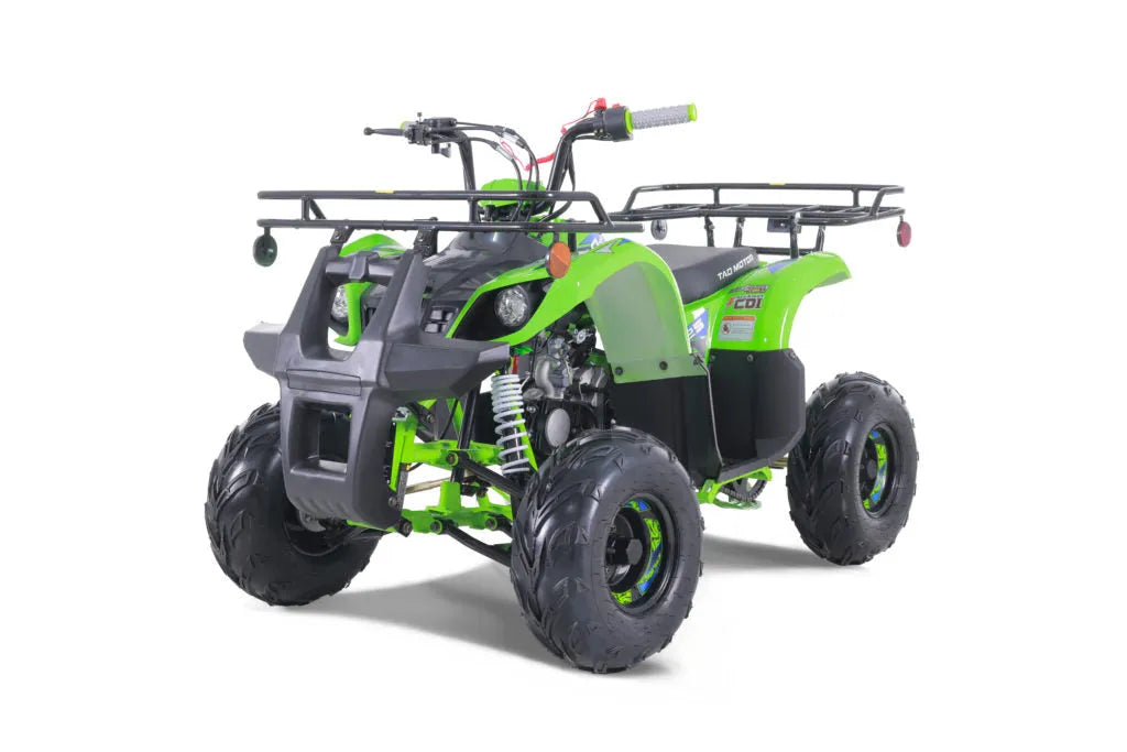Green youth ATV with rugged tires, front grill guard, and cargo racks on white background