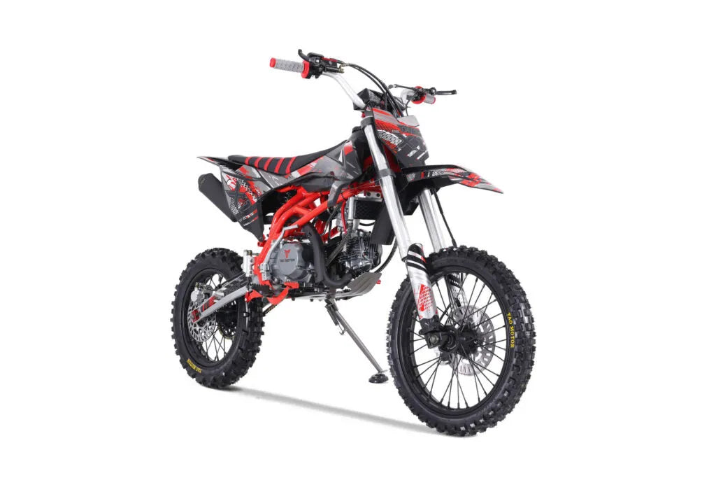 Black and red dirt bike with knobby tires and sporty graphics, studio white background