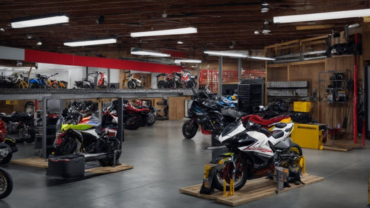 Clean organized powersports service center with motorcycles, scooters, and ATVs on display