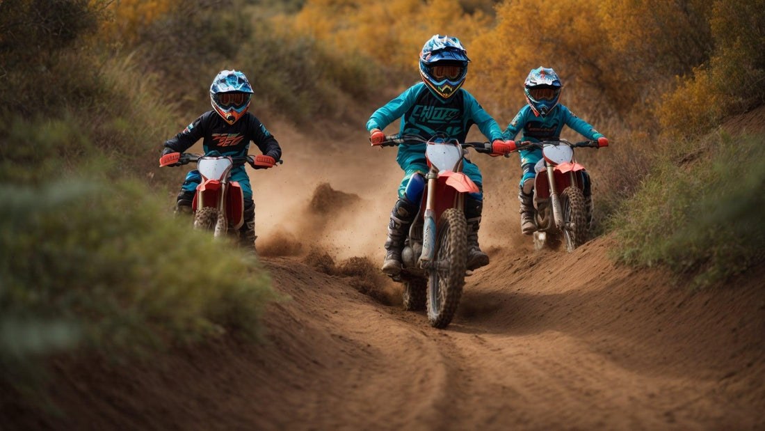 Kids riding dirt bikes on a rugged trail, wearing helmets and motocross gear outdoors