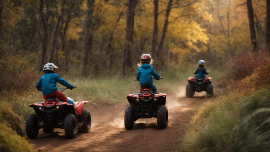 Kids riding youth ATVs on a dirt trail through a forest in autumn, wearing helmets and jackets.