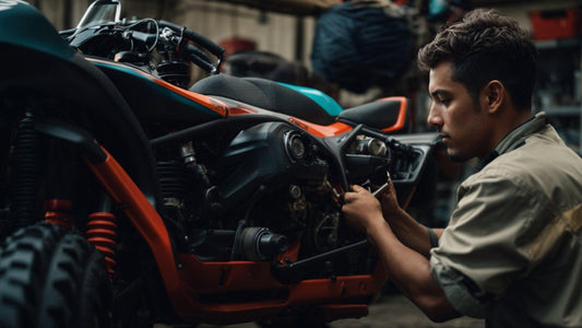 Mechanic repairing small kids ATV in workshop, focusing on engine and suspension detail