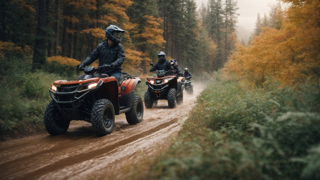 People riding ATVs on a muddy forest trail in autumn with protective gear