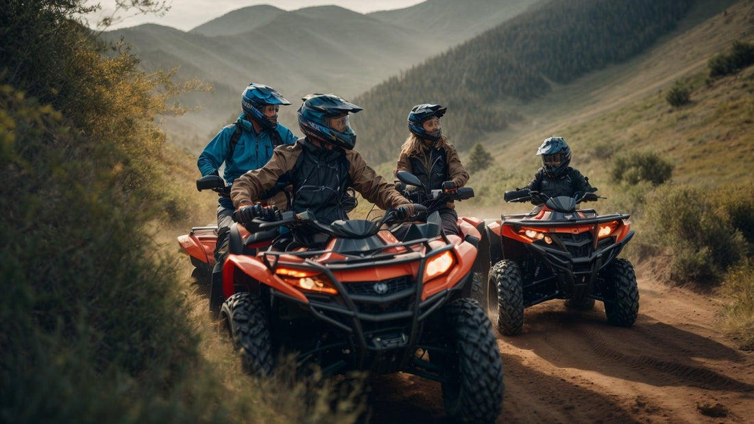 Group riding red ATVs on a dirt trail through scenic mountain landscape