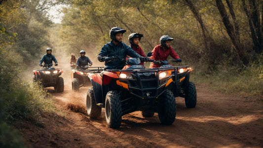 Group riding ATVs on a forest trail, all wearing helmets, in daylight outdoors.