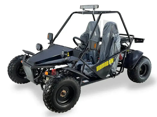 Black off-road go-kart with roll cage, two seats, knobby tires, and front LED lights