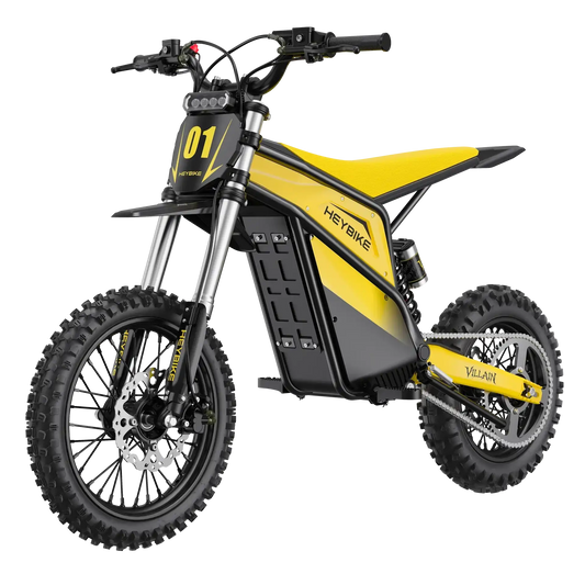 Yellow and black electric dirt bike with knobby tires, off-road suspension, and side stand