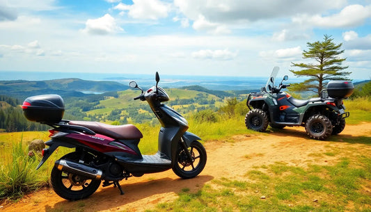 ATV and scooter parked on a scenic dirt trail with hills and blue sky in the background
