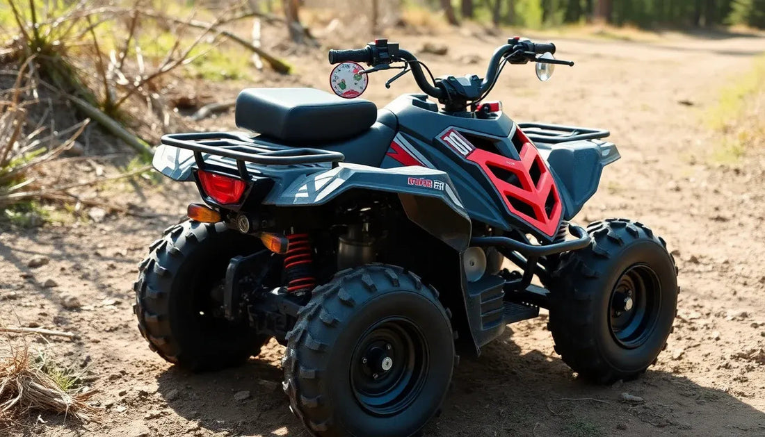 Youth ATV with rugged tires and red accents parked on a dirt trail in the outdoors
