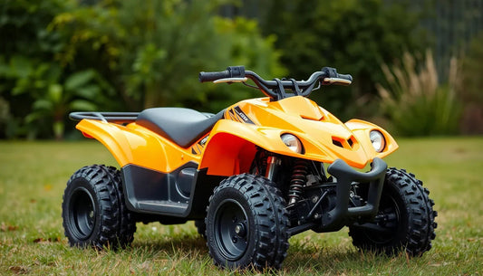 Bright orange youth ATV with rugged tires parked on grass in outdoor setting