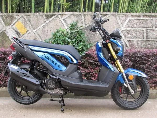 Blue Zummer scooter parked outdoors, modern frame, street tires, compact design.