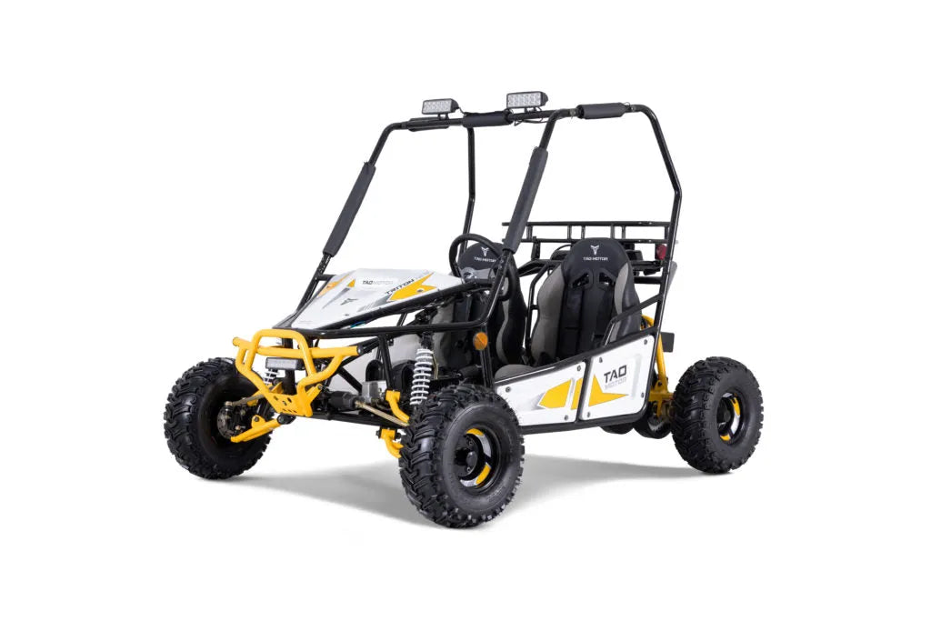 Youth go-kart with roll cage, off-road tires, and sporty yellow and white design on white background.