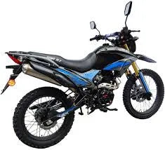 Black and blue off-road dirt bike with knobby tires and rear suspension