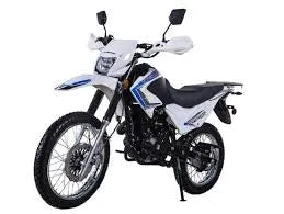 White and blue youth dirt bike with knobby tires, hand guards, and side mirrors on white background