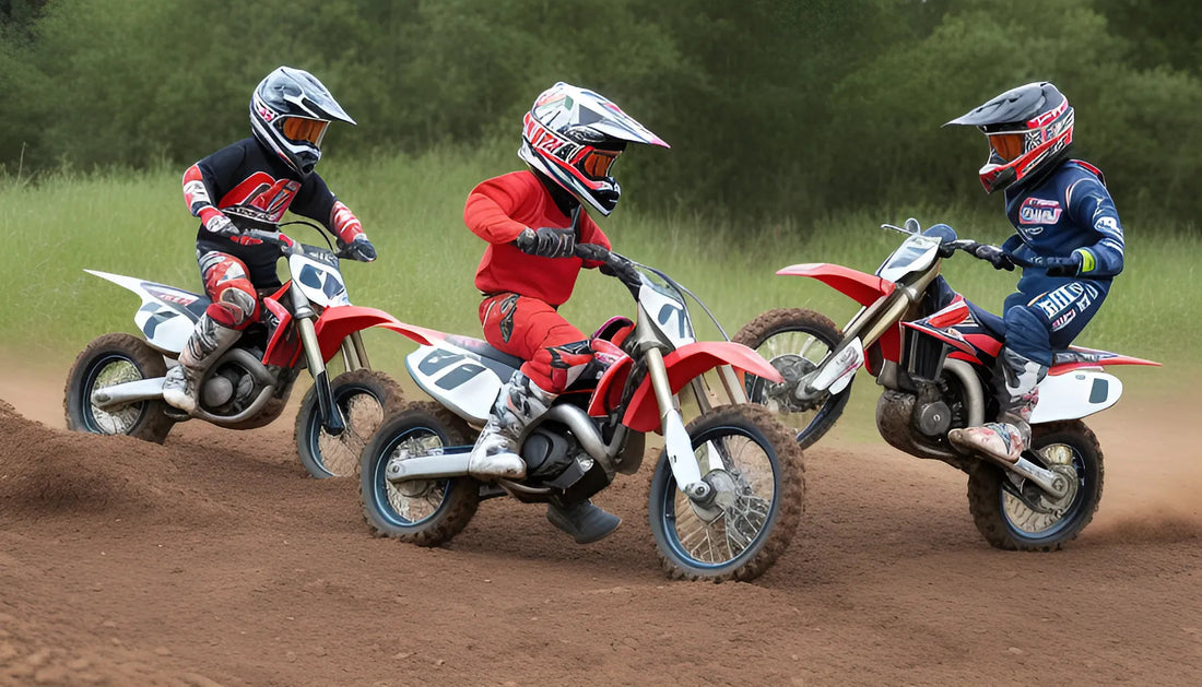 Kids riding red dirt bikes with helmets and gear on a dirt track