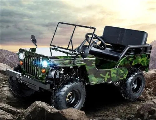 Camouflage ATV jeep for kids on rocky terrain with rugged tires and headlights on