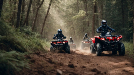 Group of riders on red ATVs driving on a dirt trail through a forest