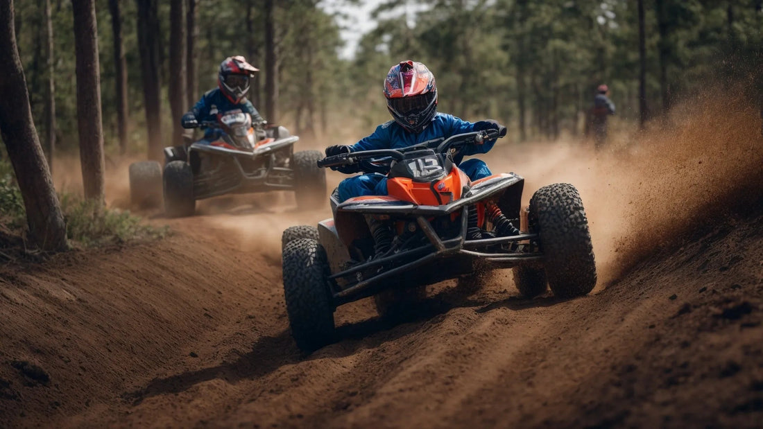 Two riders driving ATVs on a dirt trail in a forest, kicking up dust while cornering.