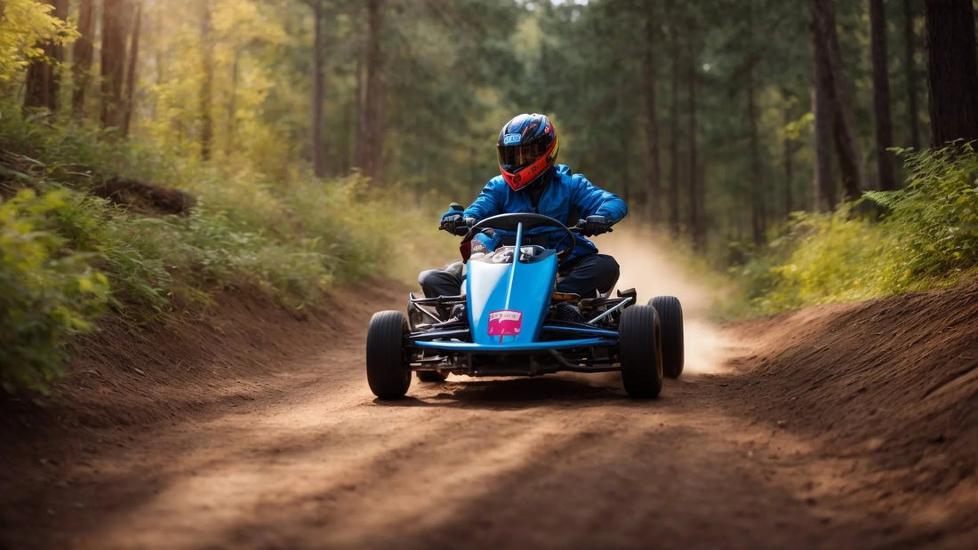 Person riding blue go-kart on a dirt trail in a forest, wearing helmet and jacket