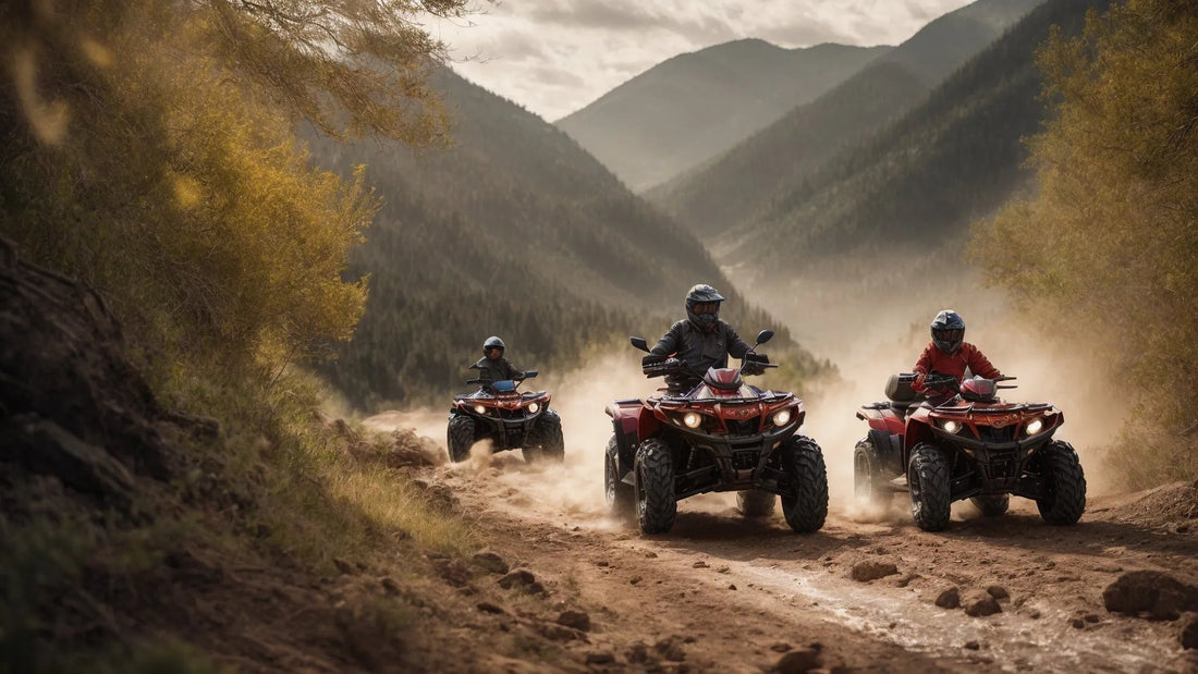 Three riders driving ATVs on a dirt trail in mountainous outdoor terrain