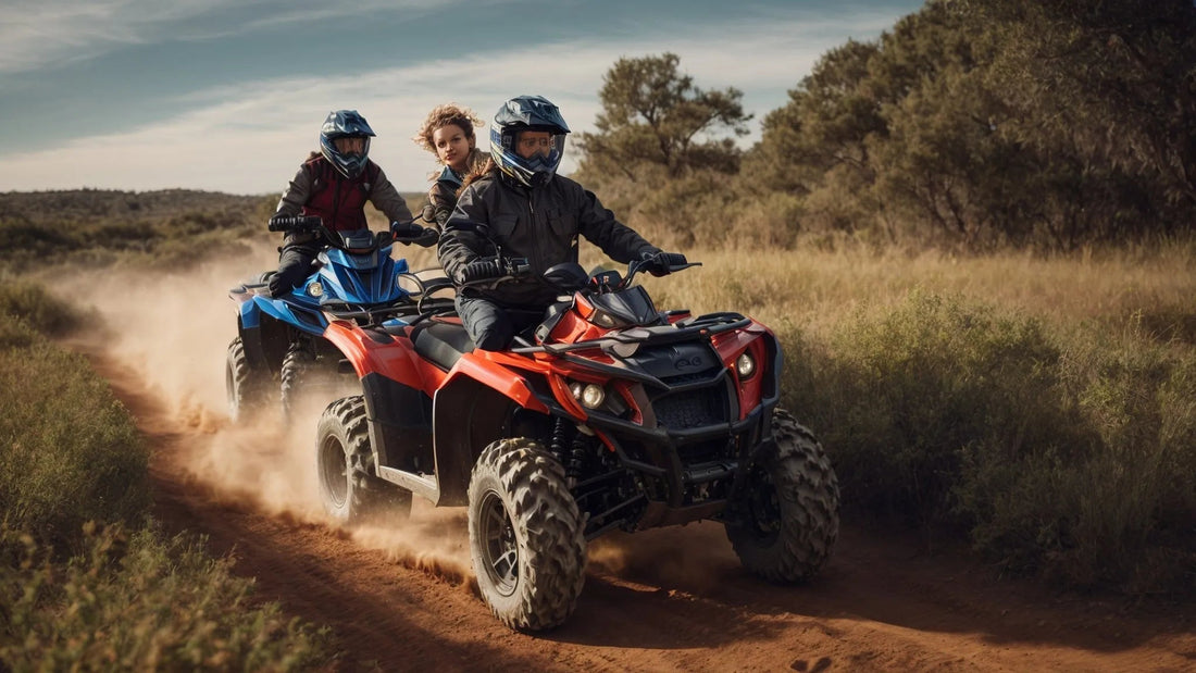 Two riders on ATVs driving on a dirt trail outdoors, kicking up dust, with trees in background