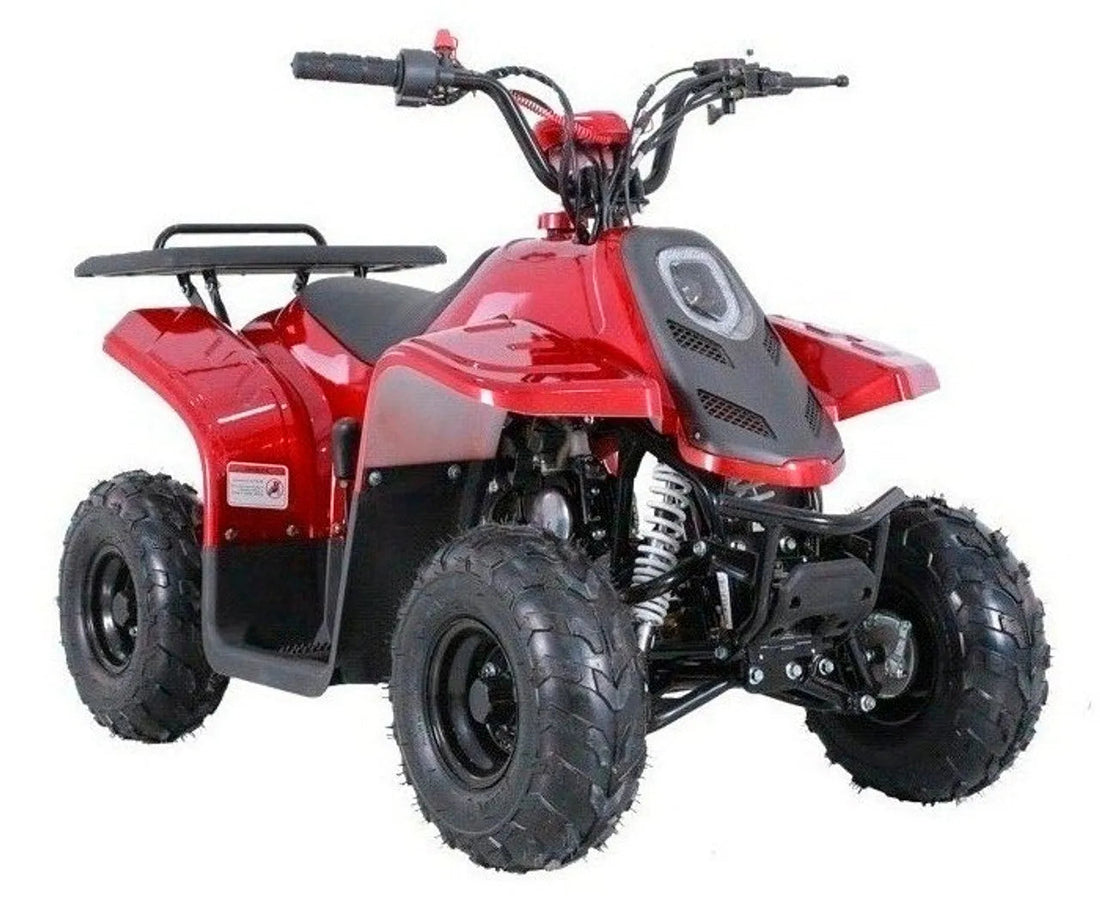 Red youth ATV quad with rugged tires on white background, entry-level all-terrain vehicle