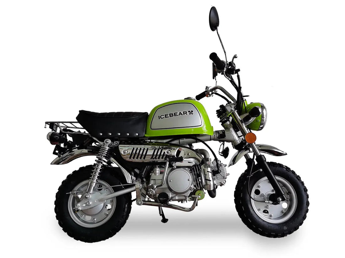 Green ICEBEAR mini bike with off-road tires, chrome accents, and rear cargo rack on white background