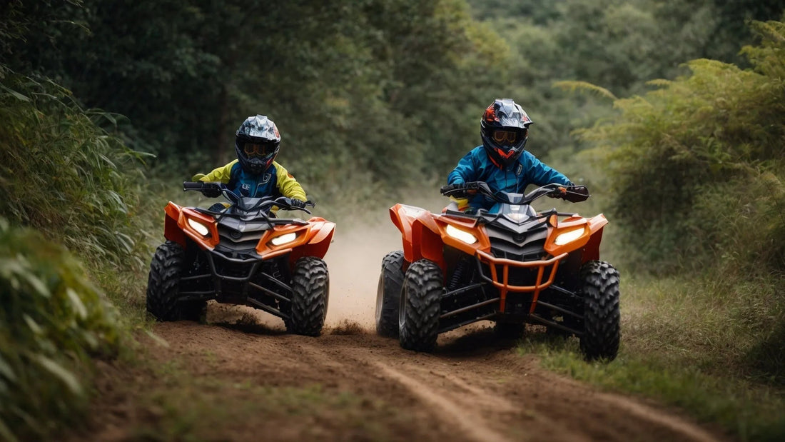 Two riders on orange ATVs driving on a dirt trail through a forested area, wearing helmets.