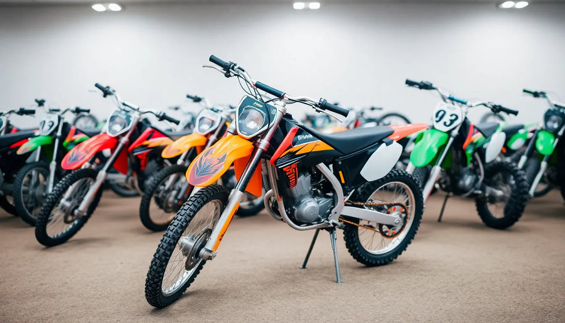 Lineup of motocross dirt bikes with knobby tires and vibrant graphics in a showroom