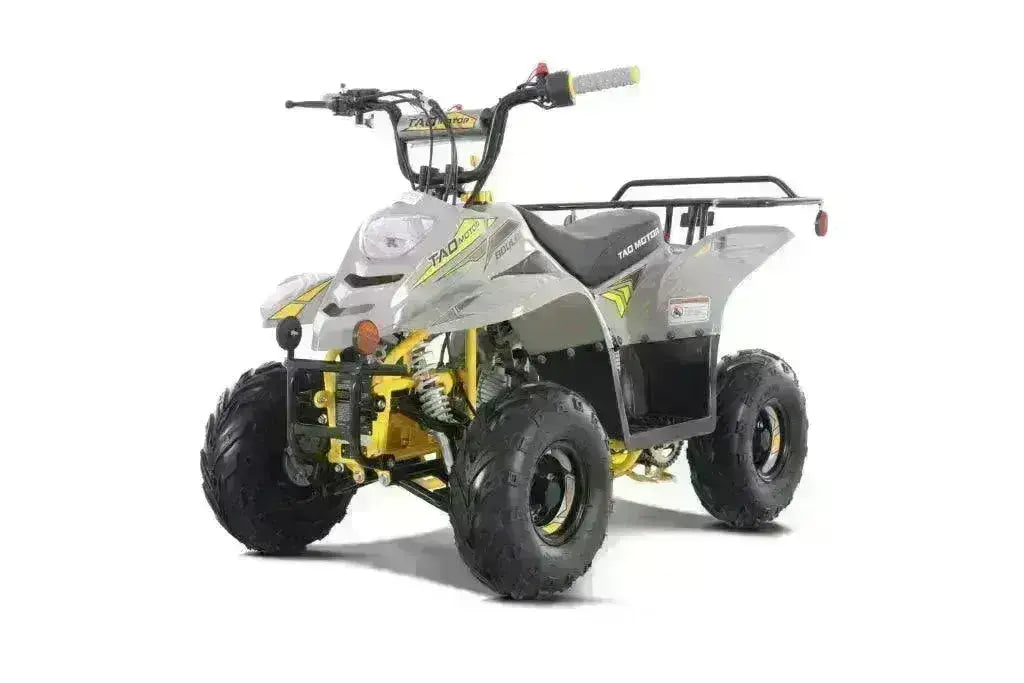 Gray and yellow 110cc kids ATV with off-road tires on a white background