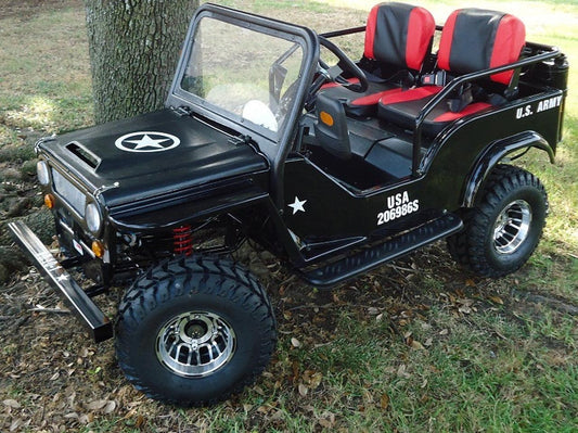 Black mini jeep-style go-kart with off-road tires and red seats parked outdoors