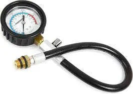 Close-up of a tire pressure gauge with a black hose against a white background