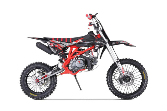 Black and red dirt bike with off-road tires and sporty graphics, side view on white background.
