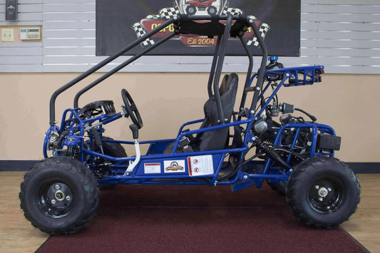Blue double seat 110cc kids go-kart with roll cage, off-road tires, and bucket seats indoors