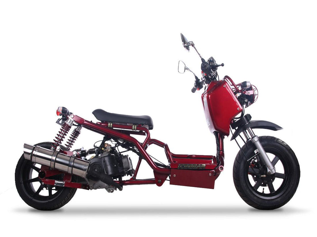 Red Gen 1 Maddog 50cc scooter with exposed frame and dual rear shocks on white background.