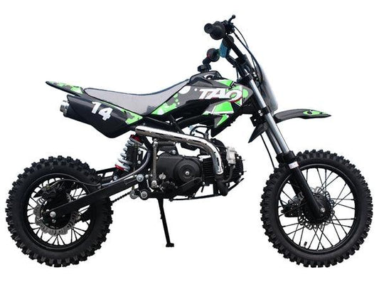 Green and black 110cc youth dirt bike with number 14 and off-road tires, side view