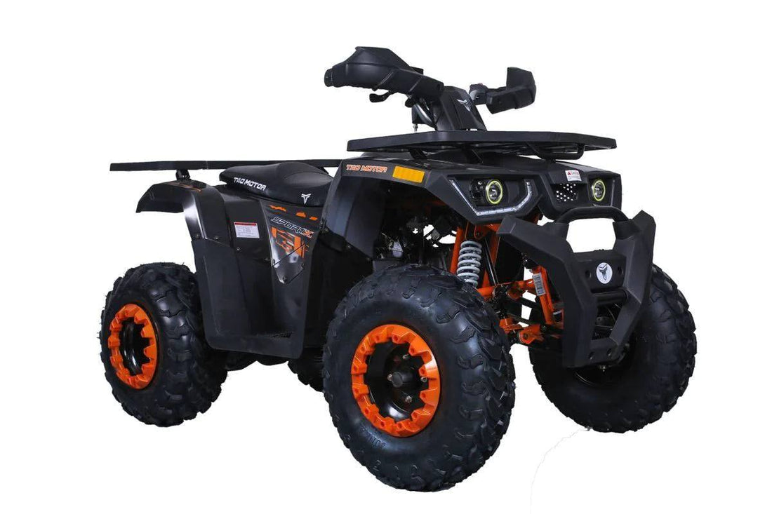 Fully automatic black and orange utility ATV with rugged tires on white background.