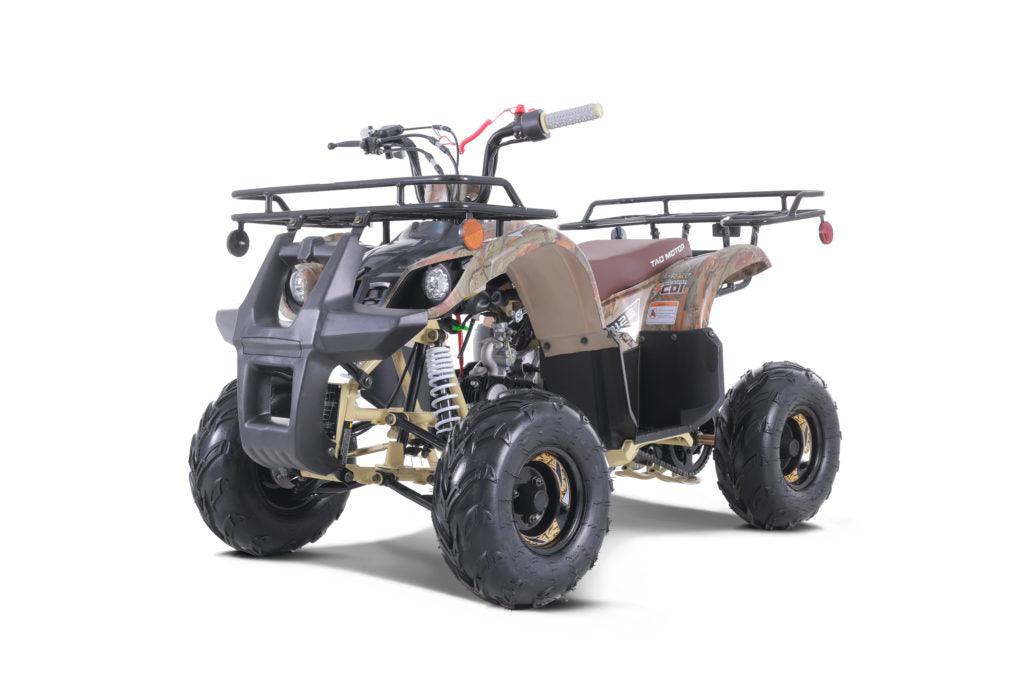 Youth camo ATV with rugged tires, front and rear racks, and headlights for kids