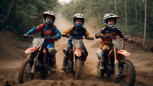 Three kids riding gas-powered youth dirt bikes on a dirt trail in motocross gear