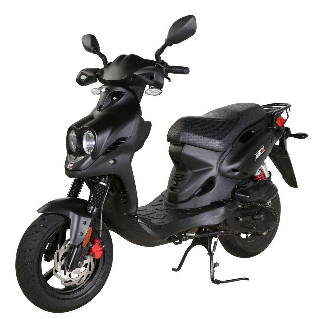 Black motor scooter with dual headlights, disc brake, and rear rack on white background