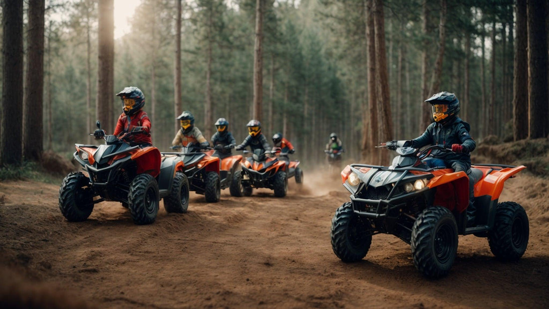 Group of kids riding orange youth ATVs on a dirt trail in a forest, wearing helmets.